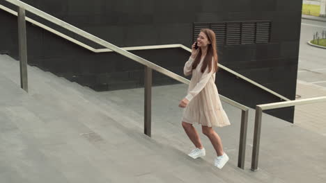 going up stairs talking on phone