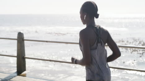 woman running by the coast