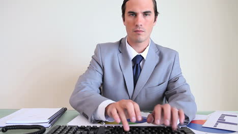 serious businessman working on documents