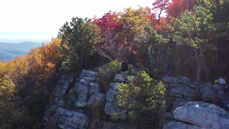 An-orbiting-shot-of-a-man-standing-on-Tibbet-Knob,-part-of-Great-North-Mountain,-the-border-between-Virginia-and-West-Virginia