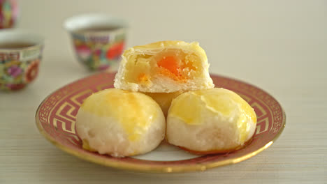 Chinese-pastry-moon-cake-with-salted-egg-peanut-or-Spring-Roll-pastry-with-nuts-and-salted-eggs