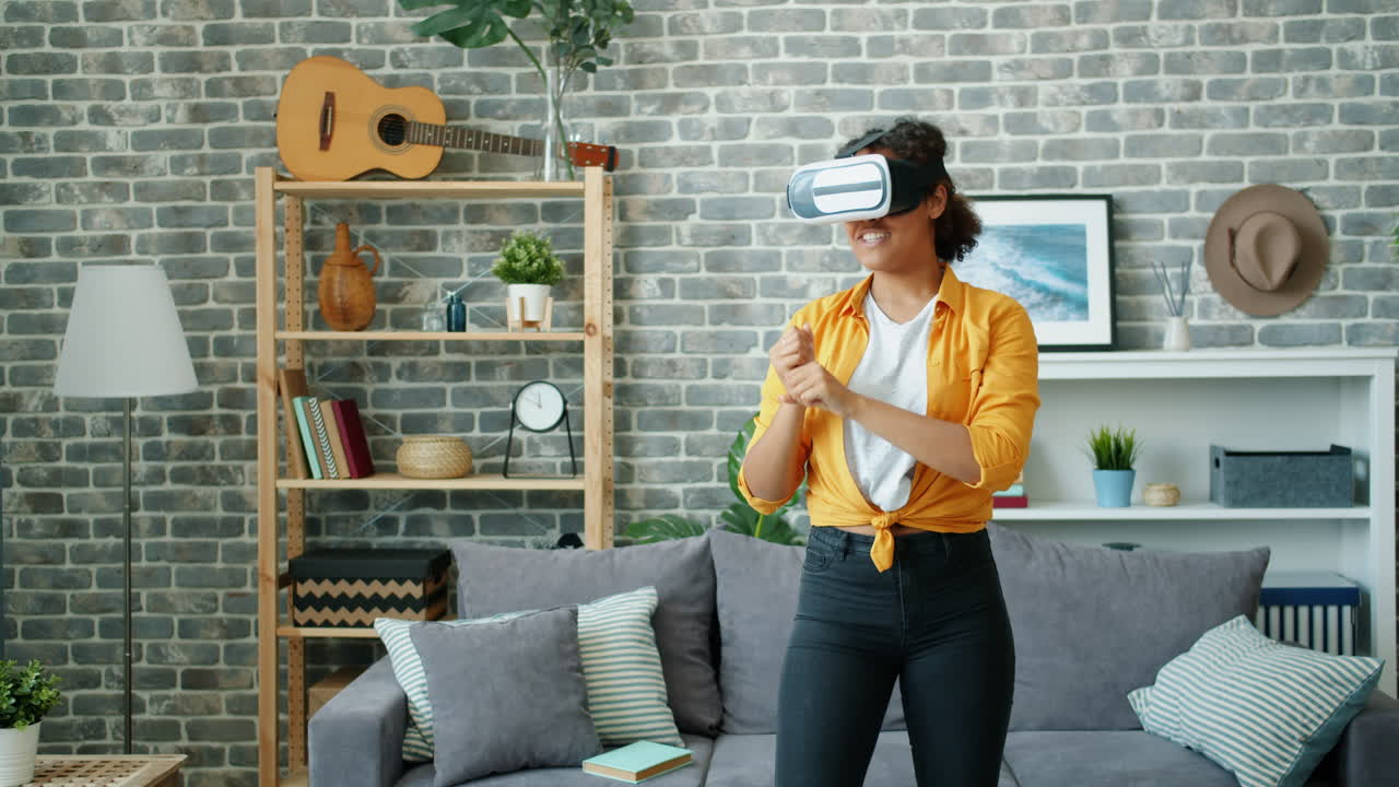 Woman playing VR game in her living room