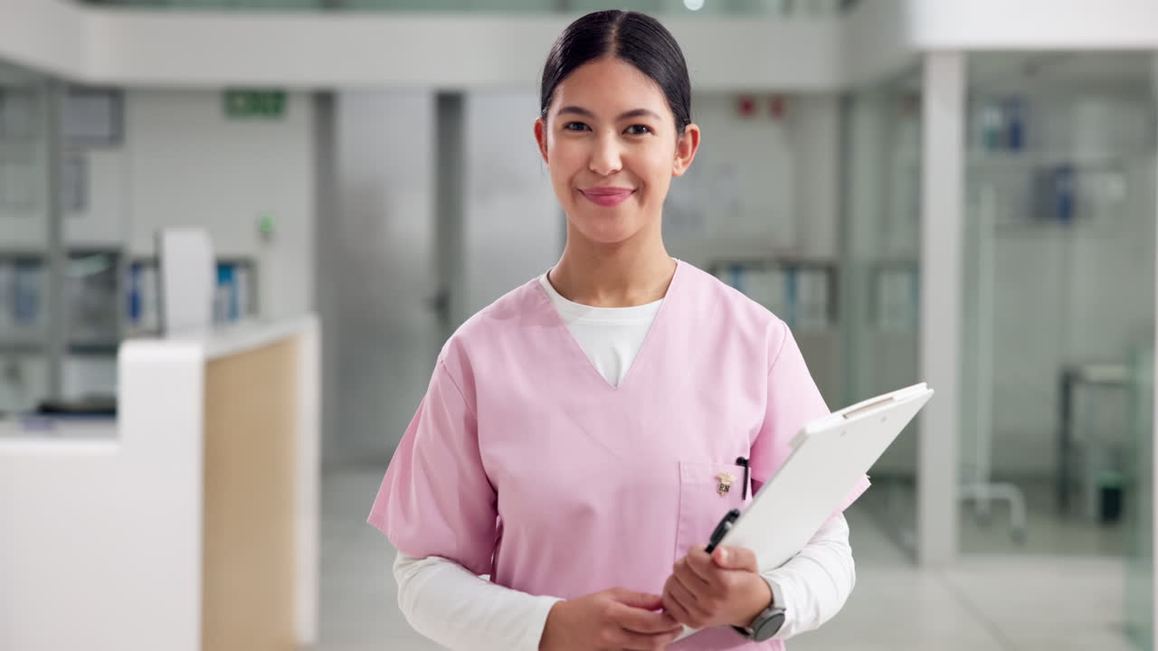 Portrait of a Smiling Nurse with a Clipboard