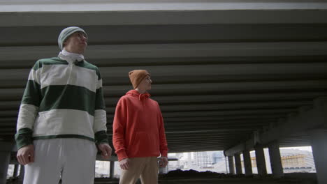 two parkourists posing for camera on street