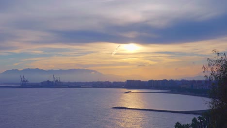 dramatic sky during sunset at malaga, spain