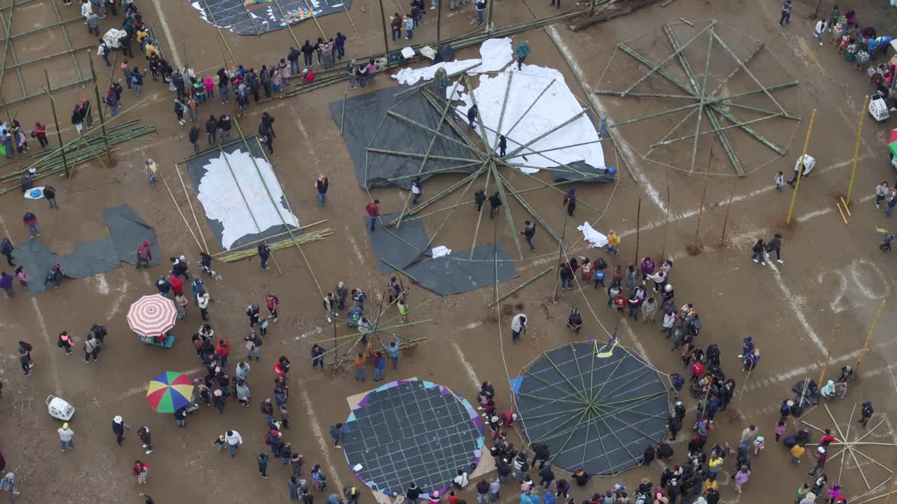 People prepare giant kites for All Saint's Day In Sumpango, aerial