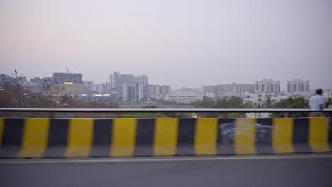 side window view of hitech city skyline buildings and beautiful urban landscape, hyderabad, india