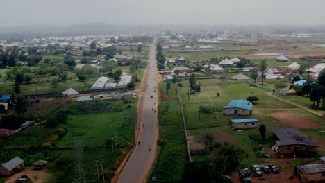 Barkin-Ladi-Town,-Nigeria---pullback-aerial-on-a-hazy-day