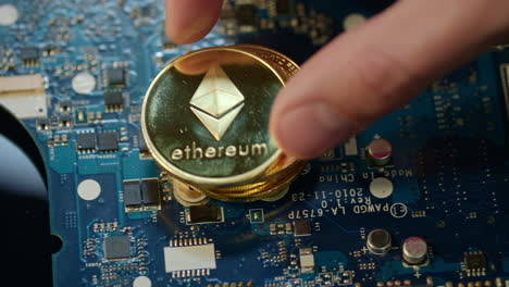 modern cryptocurrency mining. gold bitcoin and ethereum coins on circuit board