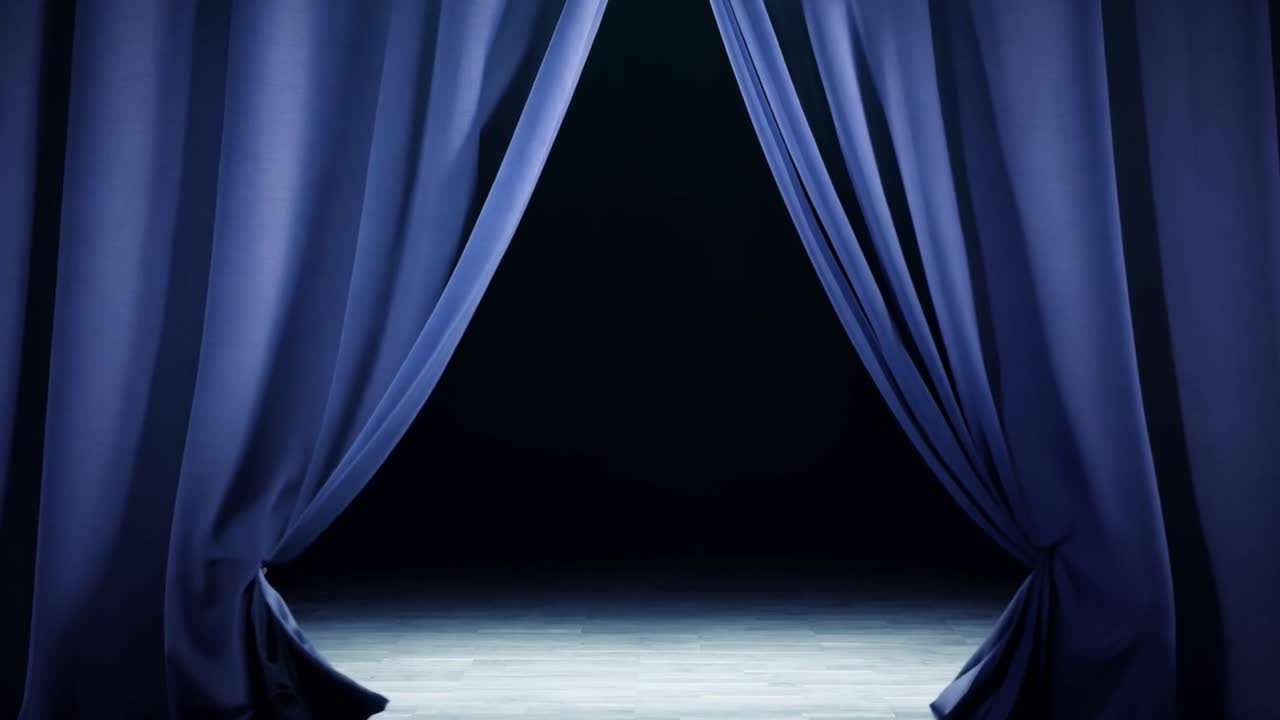 A stage with blue curtains
