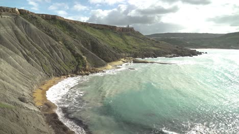 Mediterranean-Sea-Waves-Crashing-in-Qarraba-Bay-Beach-Shore