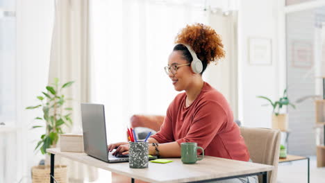 Laptop,-typing-and-black-woman-with-headphones