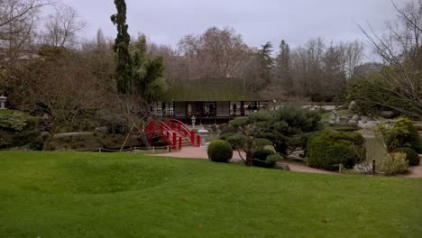 A-shot-of-a-Japan-garden-with-a-red-bridge-in-it