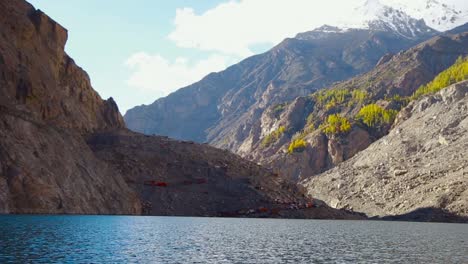 Magnificent-blue-lake-ringed-by-mountains-capped-with-snow,-the-most-spectacular-mountain-view-with-lake