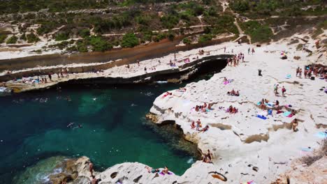 video from malta, st peter's pool on a sunny summer day