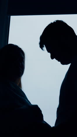 couple by window