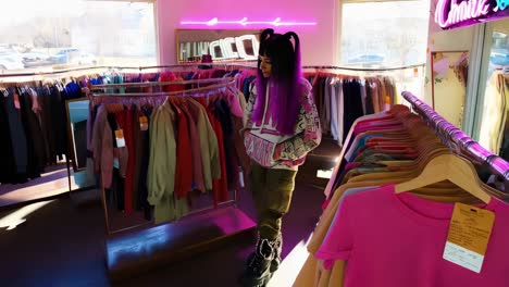 woman shopping for clothes in a trendy boutique