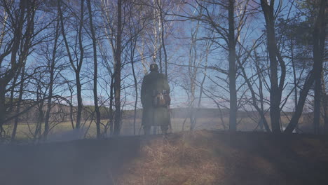 german soldier in a forest during winter