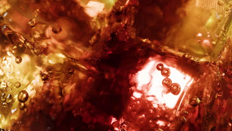 close-up of ice cubes in a carbonated drink