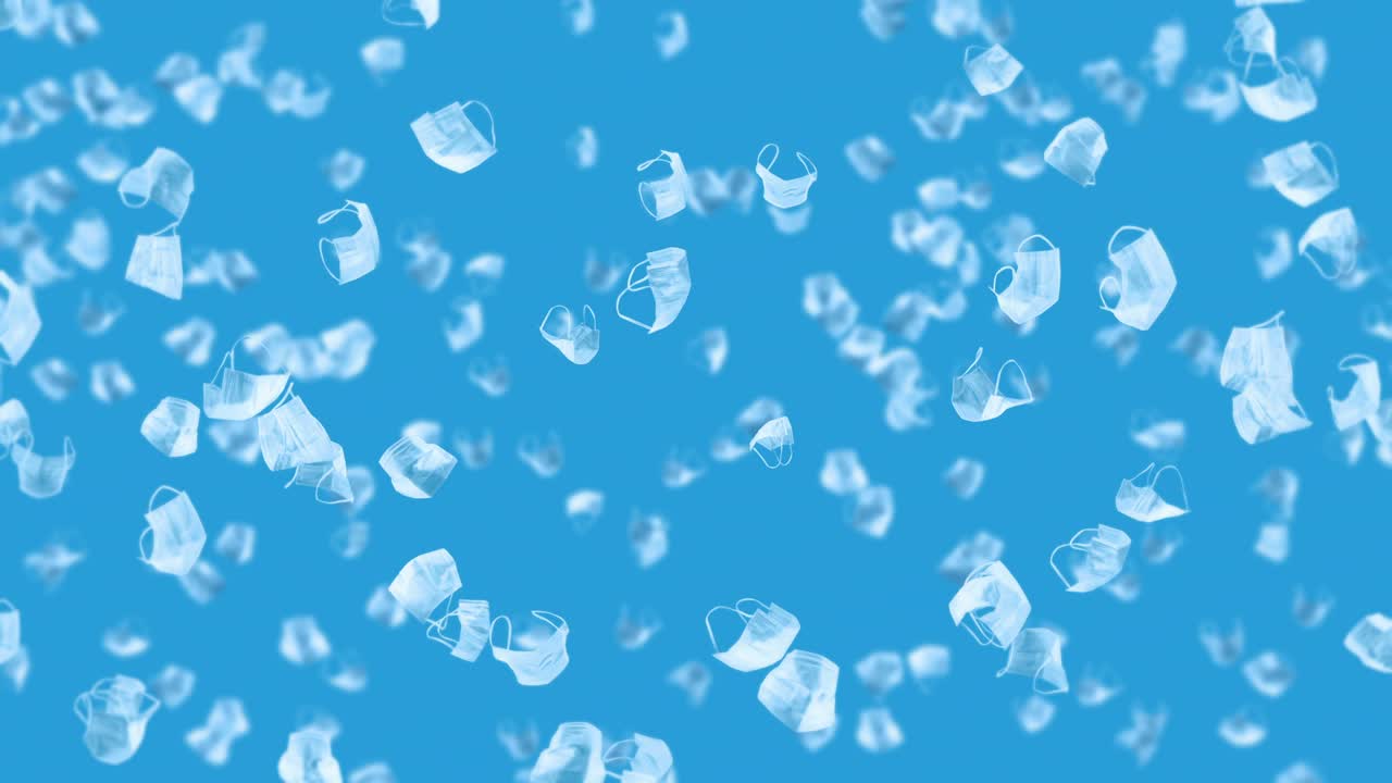 파란색 바탕에 많은 색 마스크를 날리는 의료 개념, 수술 보호 마스크, 마스크 회전의 3d 애니메이션, 루프 애니메이션.