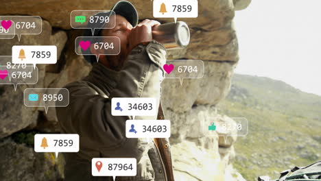 adult hiker drinking water under rocky overhang, showing floating social media marketing icons