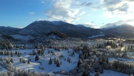 snow covered mountain town aerial view