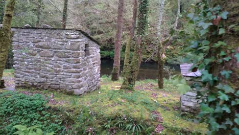 cabin oven mountain shelter built with stones near the sor river with forest and oaks