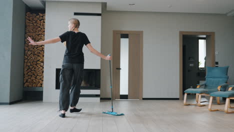 teenager dancing while cleaning