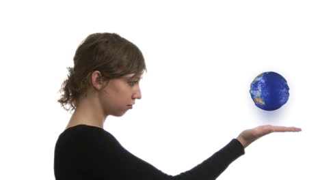 woman looking at globe