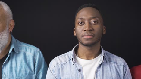 close-up face portraits of multiethnic people. multiethnic people looking at camera.