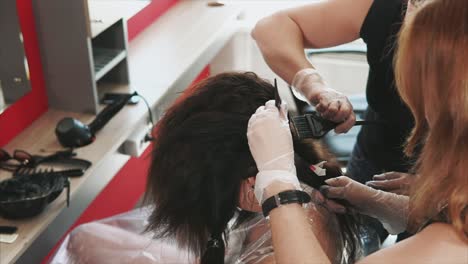 hair coloring session in a salon