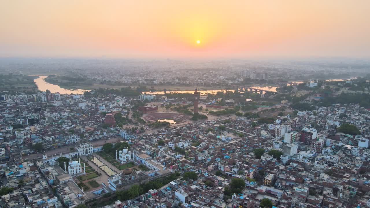 Breathtaking aerial view of Lucknow city, featuring the Clock Tower and the bustling roads below.