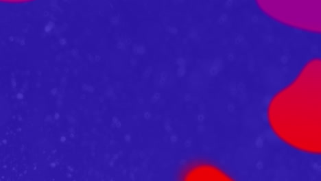 animation of blue, red and purple globules moving on blue background