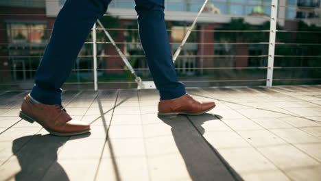 man walking on a wooden deck