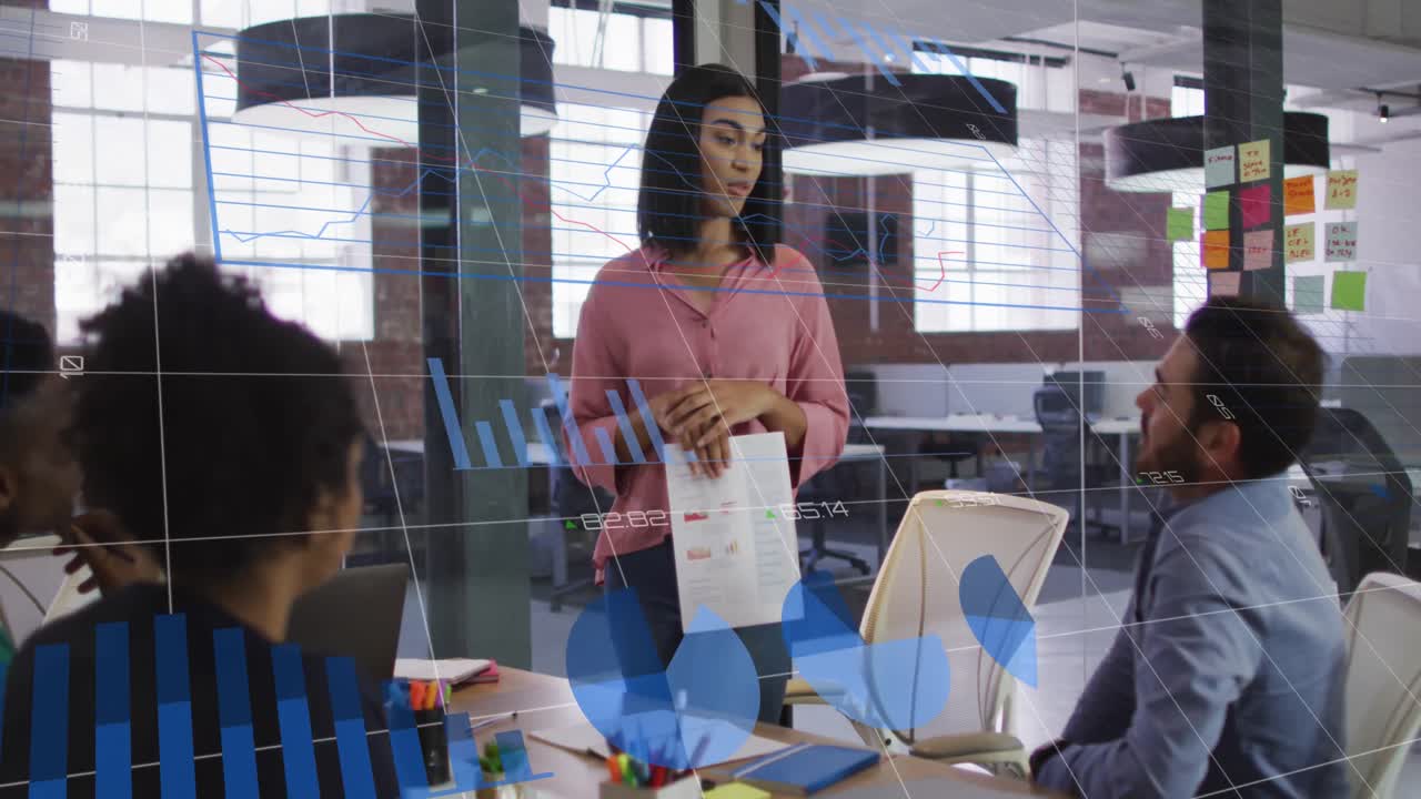 Statistical data processing against caucasian woman discussing with her office colleagues at office