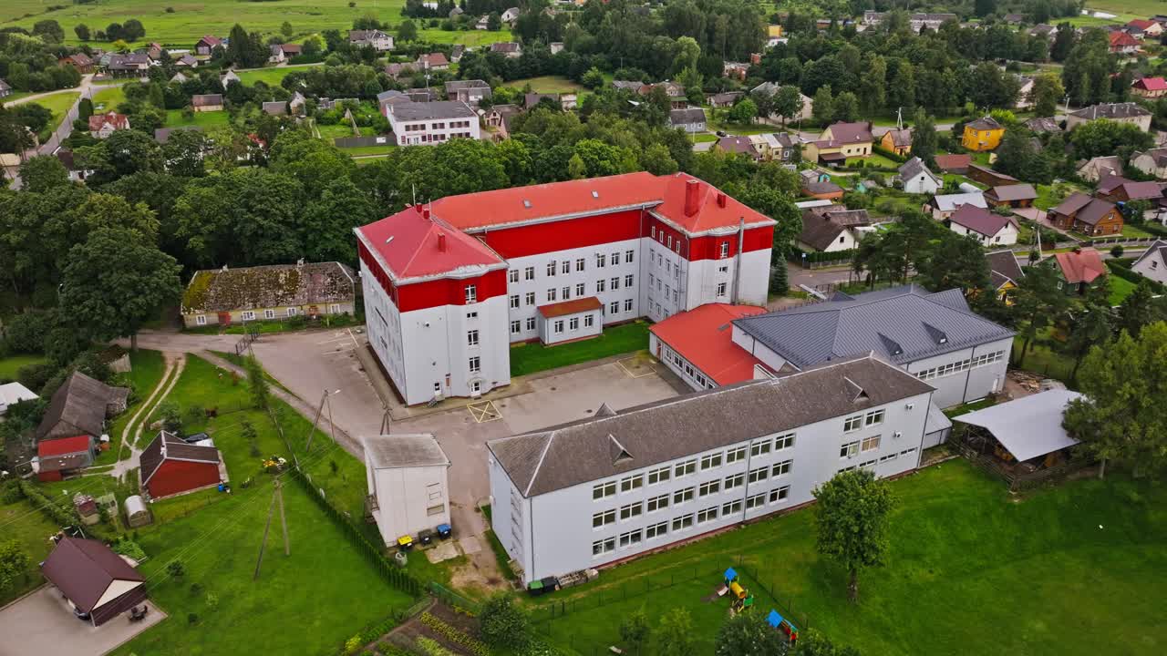 Drone moves toward Skaudvile Gymnasium in Taurage District Lithuania