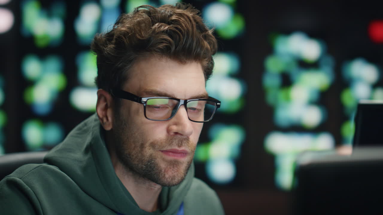 Inspired software developer working computer technical room closeup. Happy man