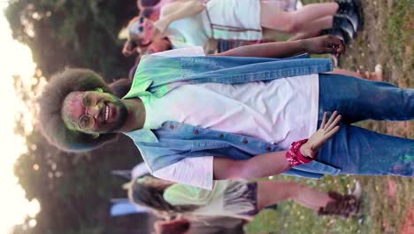 Swipe-up-video-of-African-man-in-holi-colors