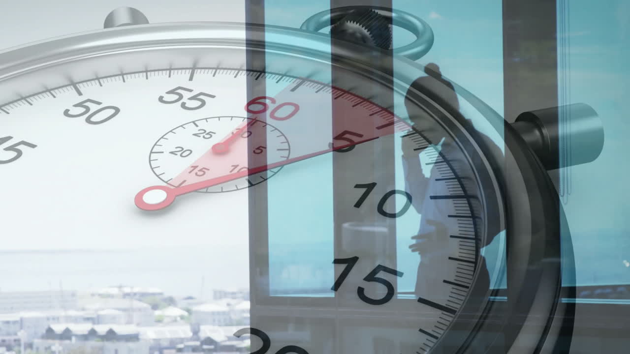 Overlaying large stopwatch, person looking out window at cityscape animation