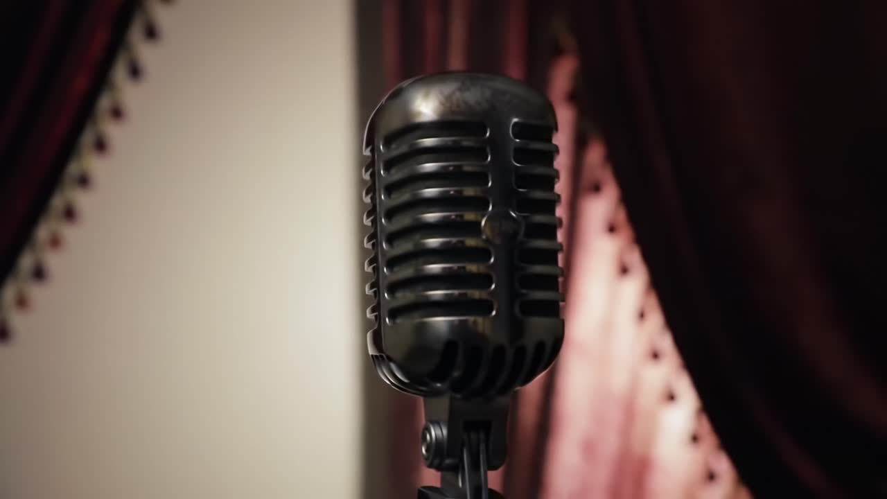 A Classic Microphone Captured in Two Frames, Showcasing Its Vintage Charm Against a Softly Draped Background, Perfect for Evoking Nostalgia and Musical Memories
