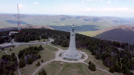 aerial footage of the war memorial tower at the summit of mt