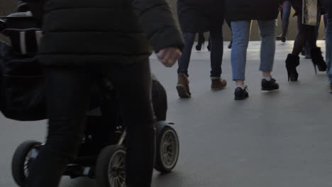 people walking on sidewalk in the city