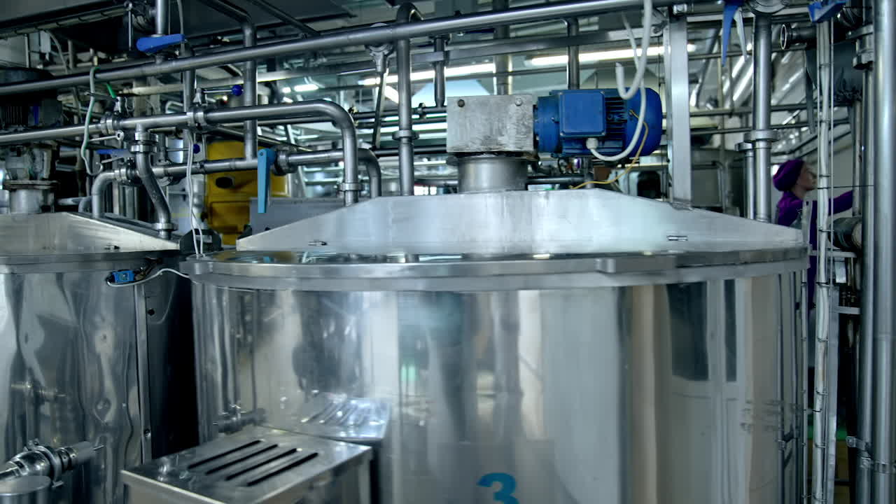 Industrial organic food making process. Modern sterilized milk production factory.
