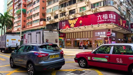 vehicles navigate a bustling city intersection