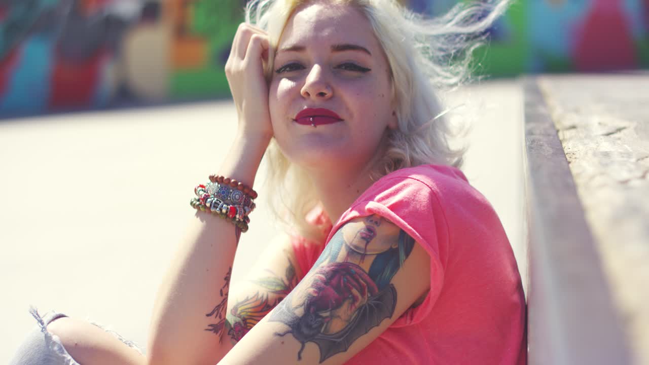 Attractive young woman staring into the sun