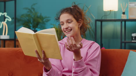 School-girl-reading-funny-interesting-fairytale-story-book,-leisure-hobby,-education,-learning-study