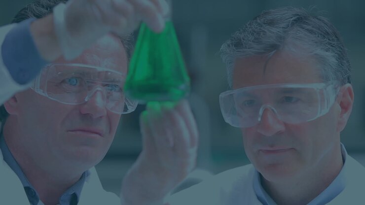 Animation of molecules over diverse scientists in lab