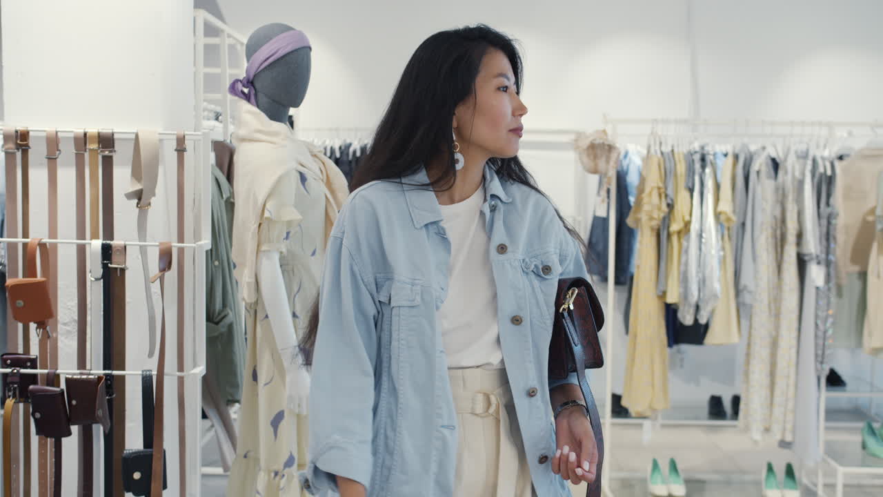 Woman Shopping for Fashion in a Boutique