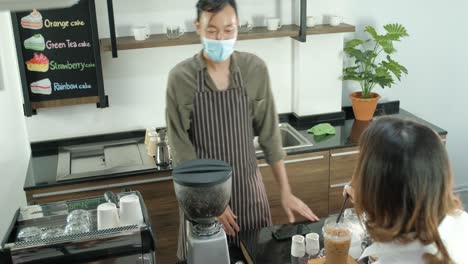 man in take away coffee shop with a cup of hot coffee in the morning