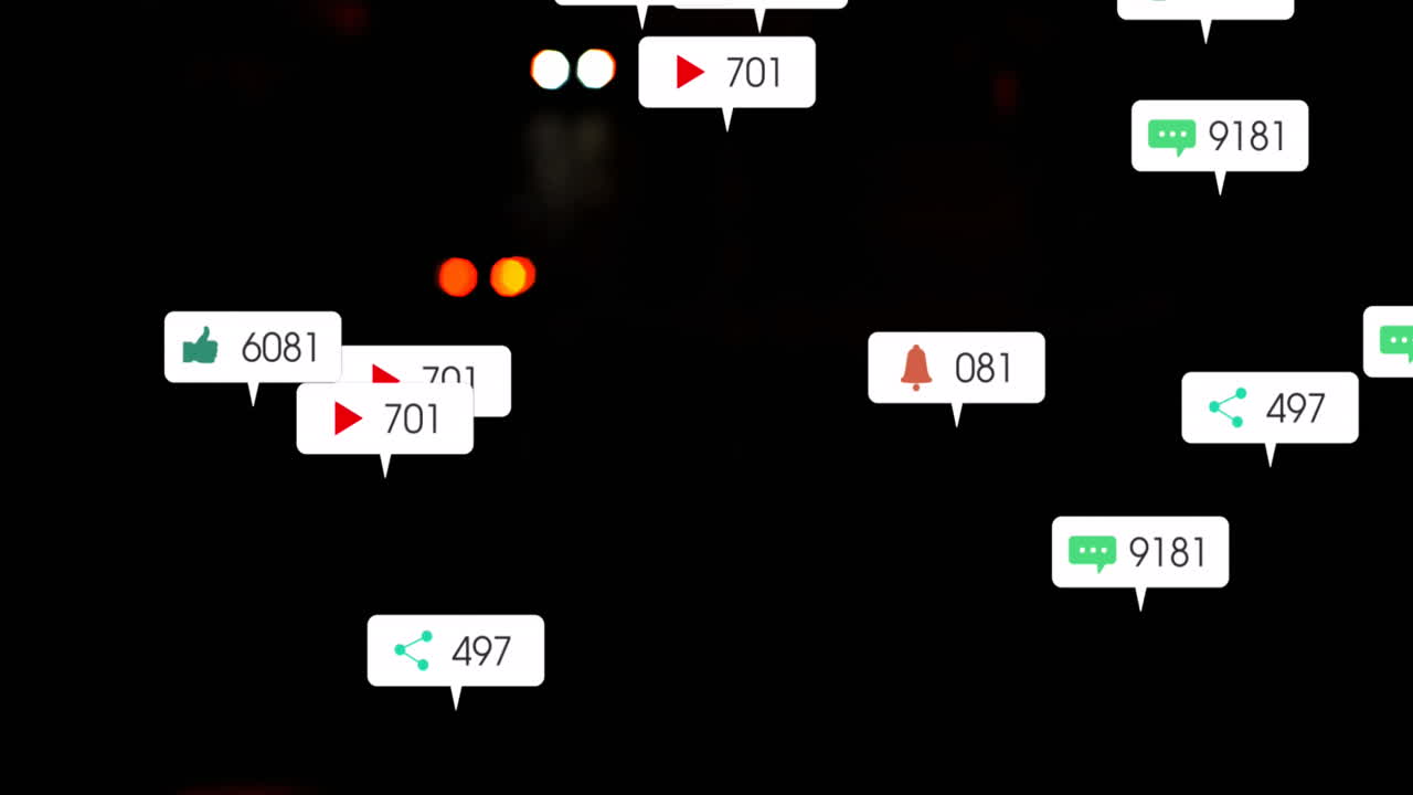 소셜 미디어 아이콘과 숫자의 애니메이션 초점 밖의 도시 및 교통 신호등